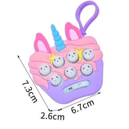 Jucarie pentru copii portabila Klevo, joc Gopher, cu lumini si muzica, tip breloc, model unicorn, material silicon si ABS, multicolor