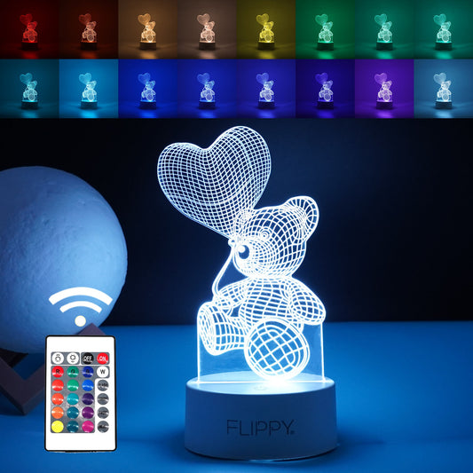 Lampa LED decorativa, Klevo, 3D, Ursulet cu balon inima, cu telecomanda, doua moduri de alimentare USB si baterii, 20 cm inaltime, din material acril si lumina multicolora, alb