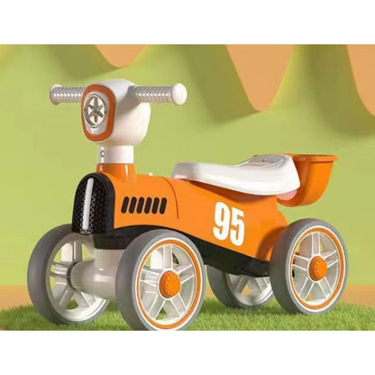 Bicicleta fara pedale pentru copii Klevo, cu lumini si muzica, 4 roti, varsta 1-3 ani, material PP, 63 x24 x41 cm, portocaliu