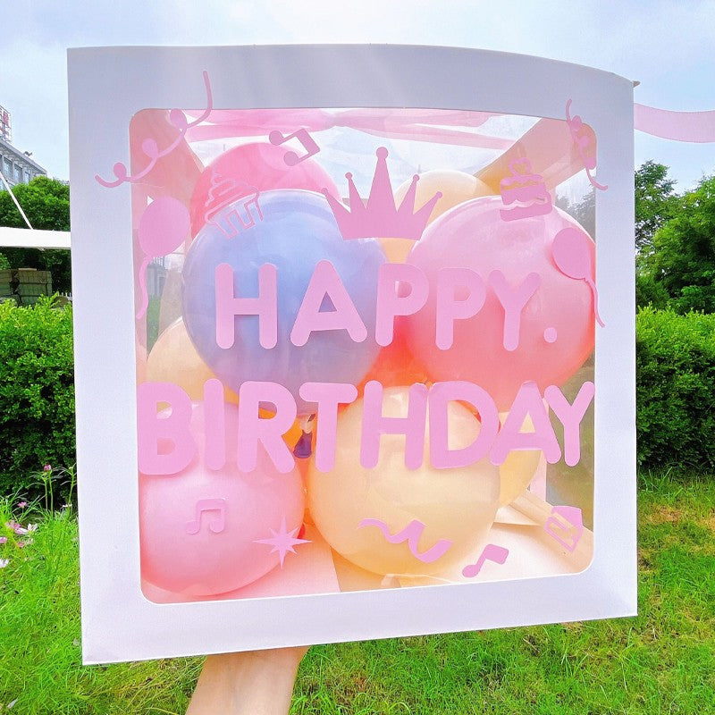 Cutie pentru Baloane, Klevo, Tematica Aniversare, Model Scris Happy Birthday, Baloane Albastre, Roz, Galbene si Panglica Incluse, Contur Alb, Transparenta, 30x30 cm