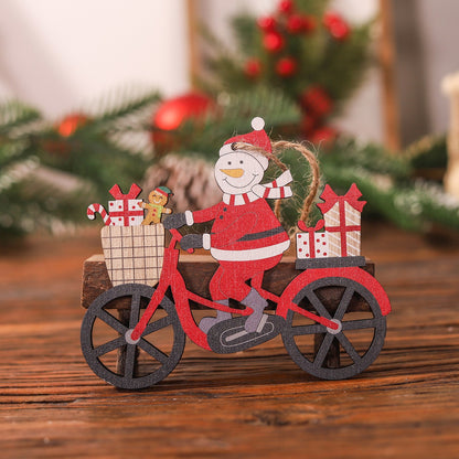 Decoratiune de Craciun din Lemn, Klevo, cu Snur pentru Agatare in Brad, Model Om de Zapada pe Bicicleta, 10.3x11.5x0.5 cm, Multicolor