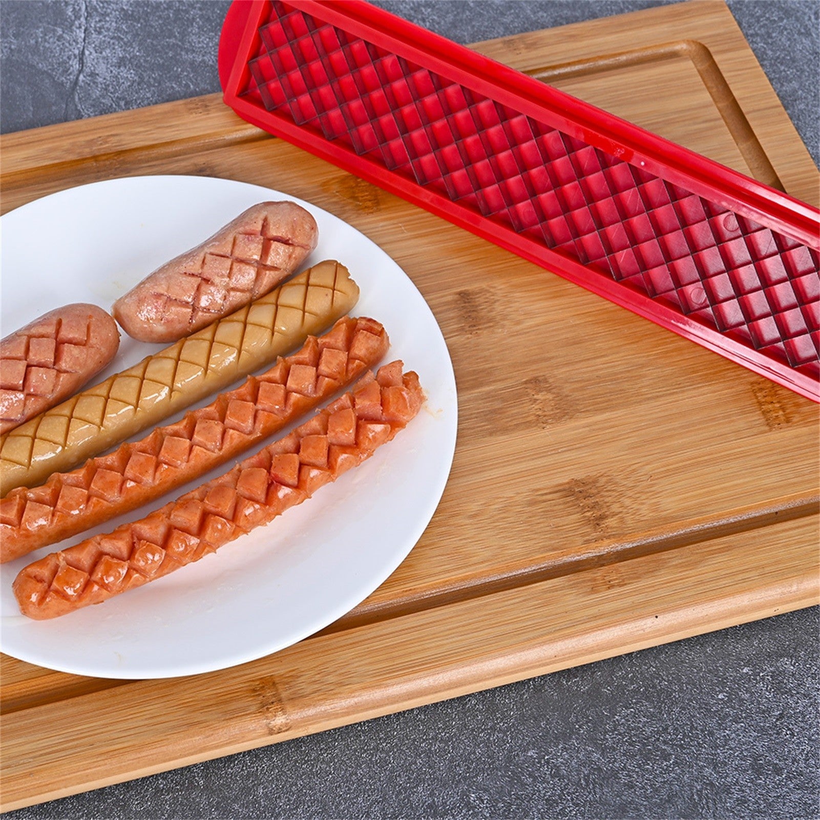 Feliator manual pentru hot-dog Klevo, crestare carnati si hot-dog, manual, potrivit pentru gratar, 29.5 x 6.5 cm, din inox si ABS, rosu