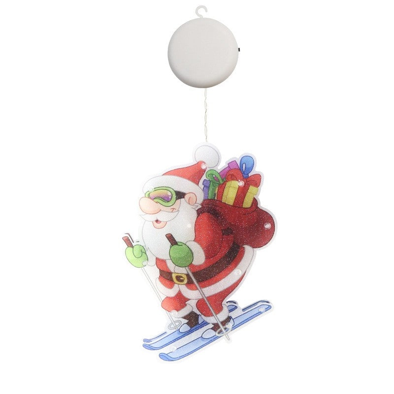 Decoratiune de Craciun pentru fereastra Klevo, Mos Craciun pe schiuri, cu LED-uri, 15 cm, alb cald