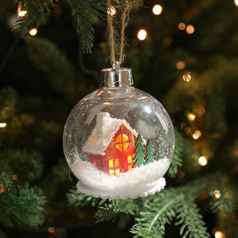 Glob pentru Bradul de Craciun LED, Klevo, Model A, Glob Transparent cu Figurina Casa si Braduti iluminat LED, Diametrul 10 cm, Baza Solida, Transparent