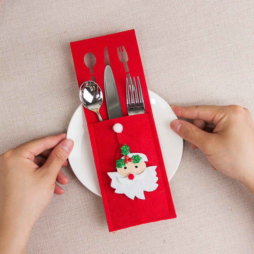 Husa decorativa pentru set tacamuri Klevo, model Mos Craciun, material poliester, 25 x 8.5 cm, rosu