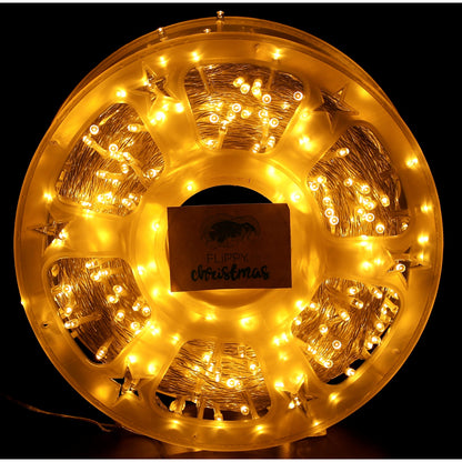 Instalatie Craciun liniara cu transformator, 100m, alb cald, 1000 LED-uri, fir transparent, 8 jocuri de lumini, Klevo