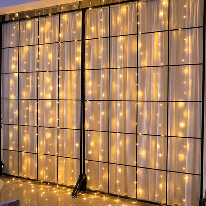 Instalatie Craciun, Tip Perdea, IP44, 12 m x 1 m, 720 LED-uri, Alb cald, cu flash, Transformator, Interconectabila, Prelungitor 3 m inclus, Fir transparent, Interior/ Exterior, Klevo