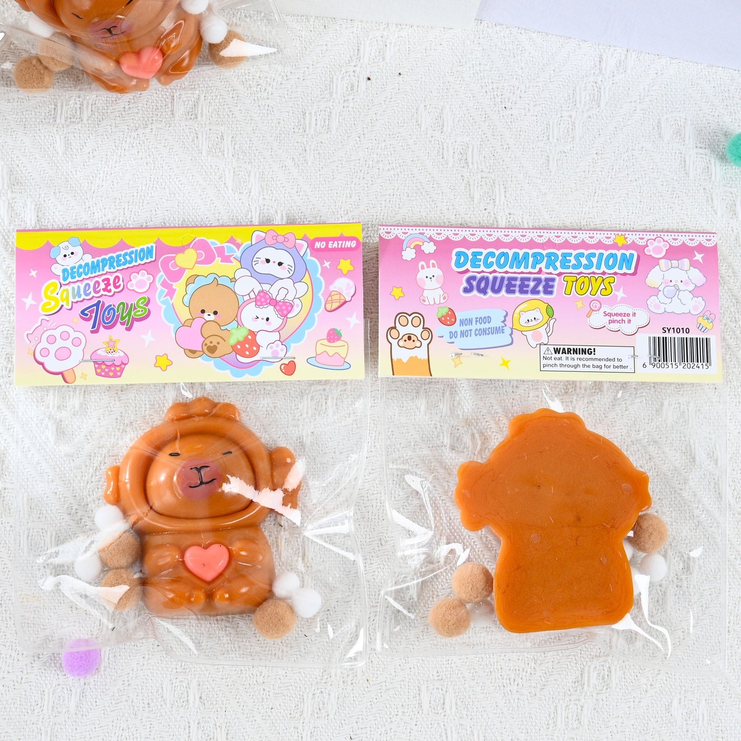 Jucarie Antistres Squishy, Klevo, cu Revenire Lenta, Model Capybara cu Inima, 7.5cmx6.5 cm, din TPR, Ambalaj Transparent, Maro