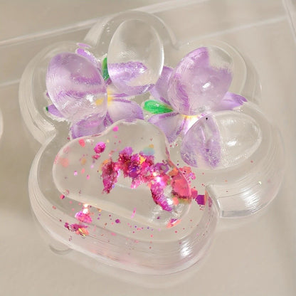 Jucarie Antistres Squishy, Klevo, Labuta de Pisica Pufoasa, cu Revenire Lenta, 7 x 6.5 cm, Model Flori 2, Transparent