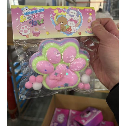 Jucarie Antistres Squishy, Klevo, cu Revenire Lenta, Model Labuta de Pisica Pufoasa, 12.5x10.5 cm, 200g, Squeeze Pinch Family, Ambalaj Transparent, Roz Curcubeu