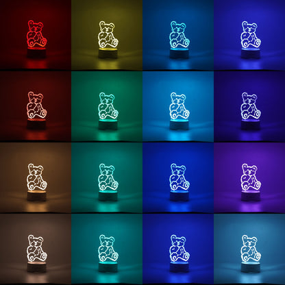 Lampa LED decorativa, Klevo, 3D, Ursulet, cu telecomanda, doua moduri de alimentare USB si baterii, 20 cm inaltime, din material acril si lumina multicolora, alb