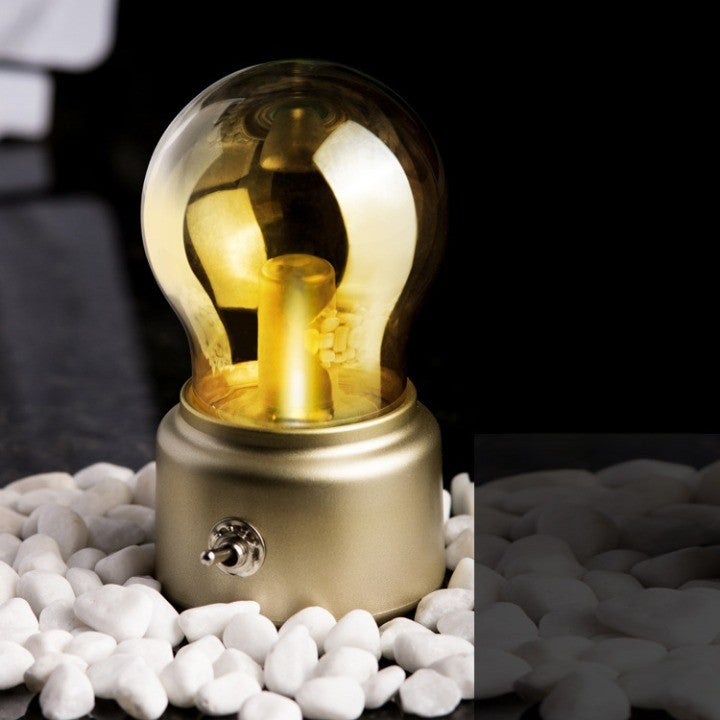 Lampa LED Decorativa sub forma de Bulb, Retro pentru interior, Bej/ Transparent, 5 V, 500 mA, ABS, Lumina Calda, Incarcare USB, Autonimie 12 Ore, Comutator Metalic, Klevo, 11x7x6 cm