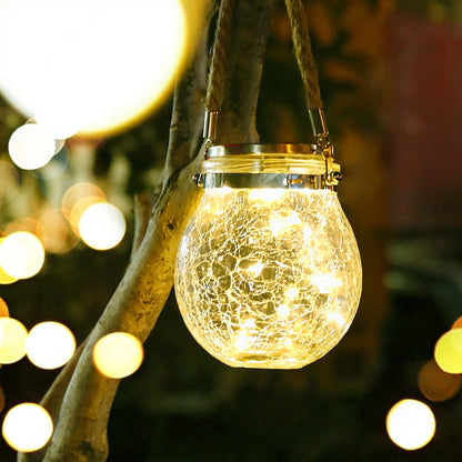 Lampa solara decorativa pentru exterior Klevo, IP65, 20 LED-uri, 600mAh, 14 x 12 cm, cu agatatoare, model borcan rotund, alb cald