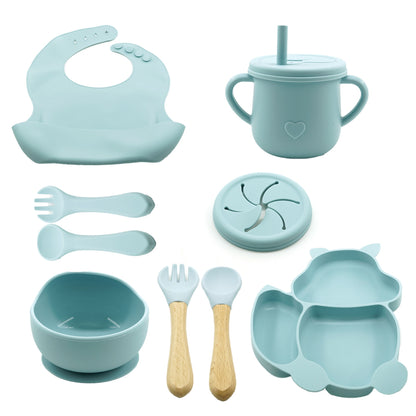 Set 10 piese diversificare bebelusi si copii din silicon Klevo, baveta, farfurie compartimentata cu ventuza, bol cu ventuza, tacamuri din lemn si silicon, cana pentru gustari, fara alergeni, baby blue