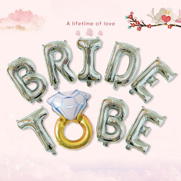 Set Baloane din Folie Metalizata, Klevo, Model Bride to Be cu Inel de Logodna, Litere de 40 cm, Baloane Party, Ambalaj Individual, Pai Inclus, Umflare cu Aer sau Heliu, Argintiu